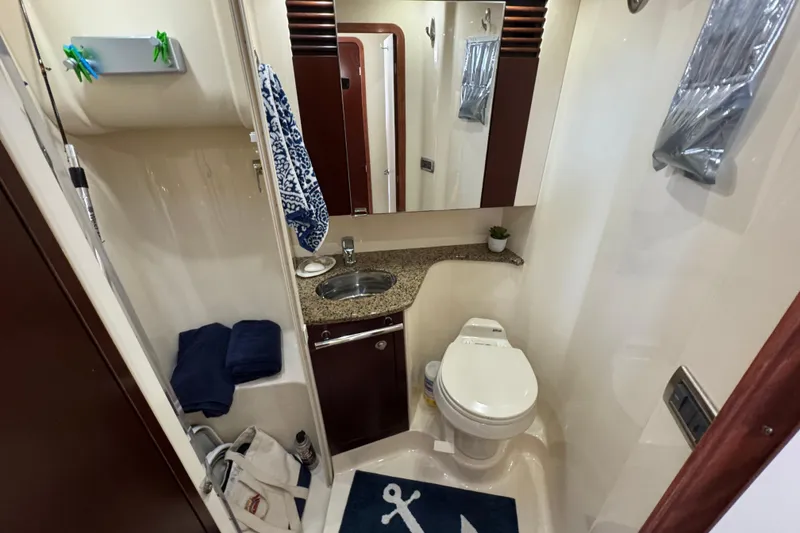 Slide: The Image of Luxurious bathroom in 2006 Sea Ray 44 Sedan Bridge yacht with modern amenities. - 23