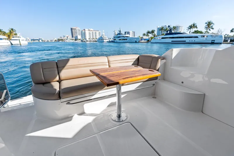 Slide: The Image of Luxurious seating area on 2014 Sea Ray 510 Fly yacht with waterfront view. - 18