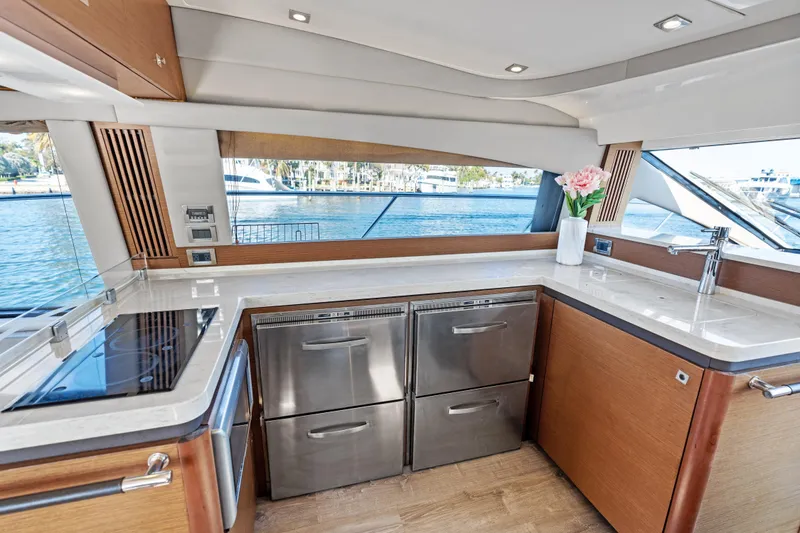Slide: The Image of Luxurious kitchen interior of 2014 Sea Ray 510 Fly yacht with modern appliances. - 34