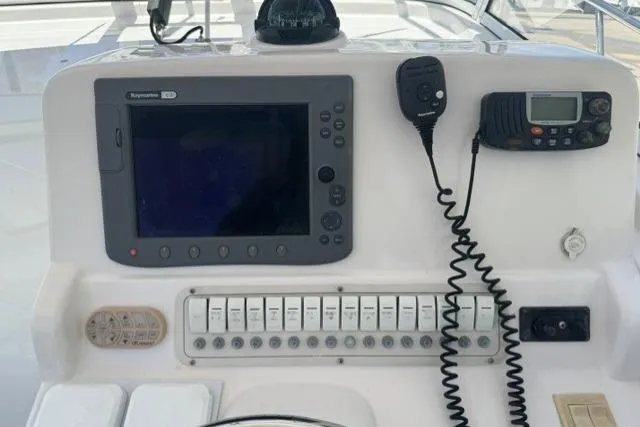 Slide: The Image of Control panel of a 2005 Pro-Line 32 Express boat with navigation equipment. - 20