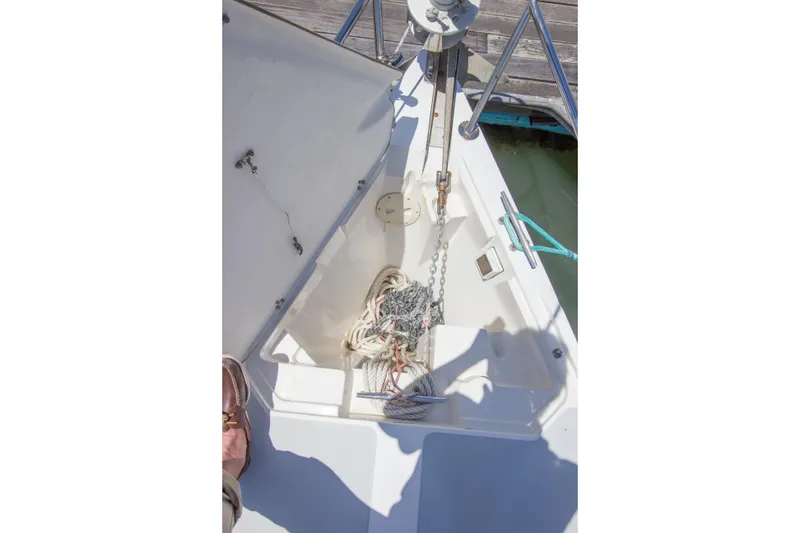 Slide: The Image of Anchor locker of a 1991 Catalina 36 sailboat with ropes and chain. - 21