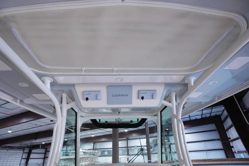 Slide: The Image of 2023 Grady-White Canyon 336 boat with Garmin electronics in a spacious interior setting. - 14
