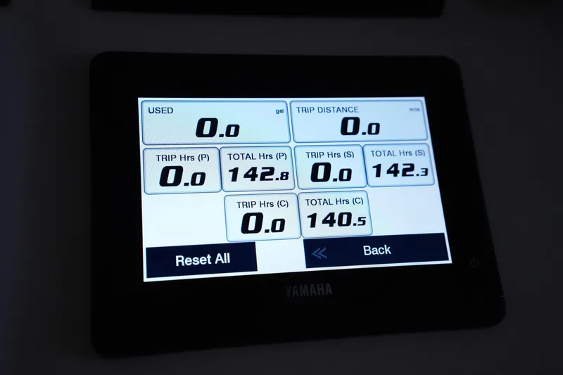 Slide: The Image of Digital display on 2023 Grady-White Canyon 336 showing trip and total hours. - 24