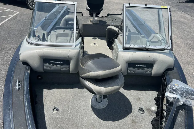 Slide: The Image of 2017 Tracker Targa V-18 WT boat interior with seating and windshield. - 2