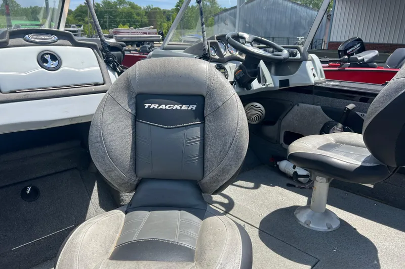 Slide: The Image of 2017 Tracker Targa V-18 WT boat interior with steering wheel and seats. - 5