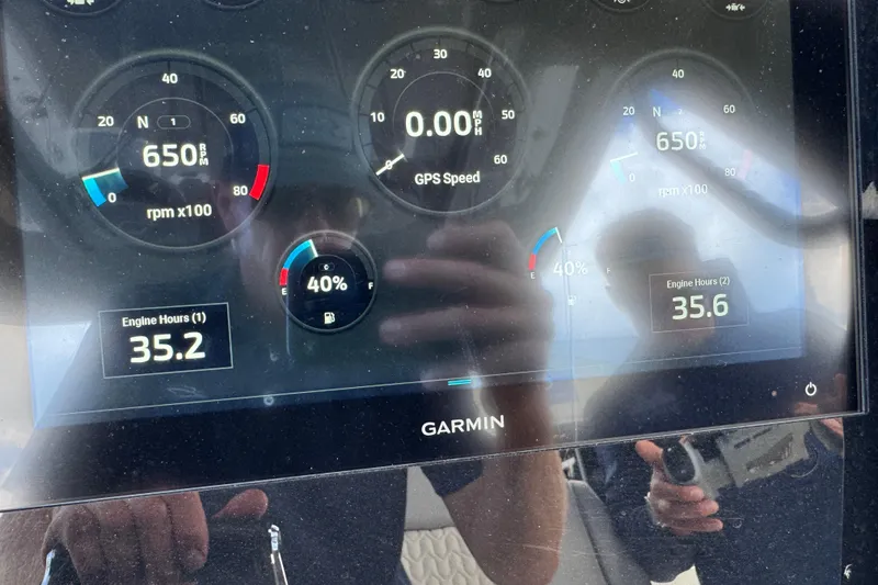 Slide: The Image of Garmin display on 2026 Scout 260 LXF showing engine RPM and hours. - 19