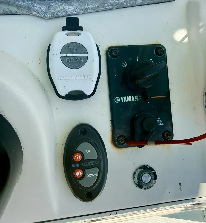 Slide: The Image of Control panel of a 2017 Skeeter SX230 boat with Yamaha controls. - 7