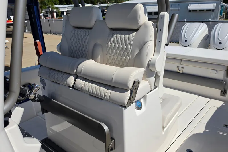 Slide: The Image of Luxurious seating on 2026 Solace 30CS boat, featuring diamond-stitched upholstery and modern design. - 12