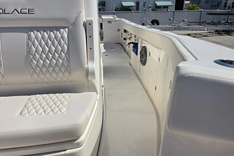 Slide: The Image of Interior view of 2026 Solace 30CS boat featuring luxurious seating and modern design. - 16