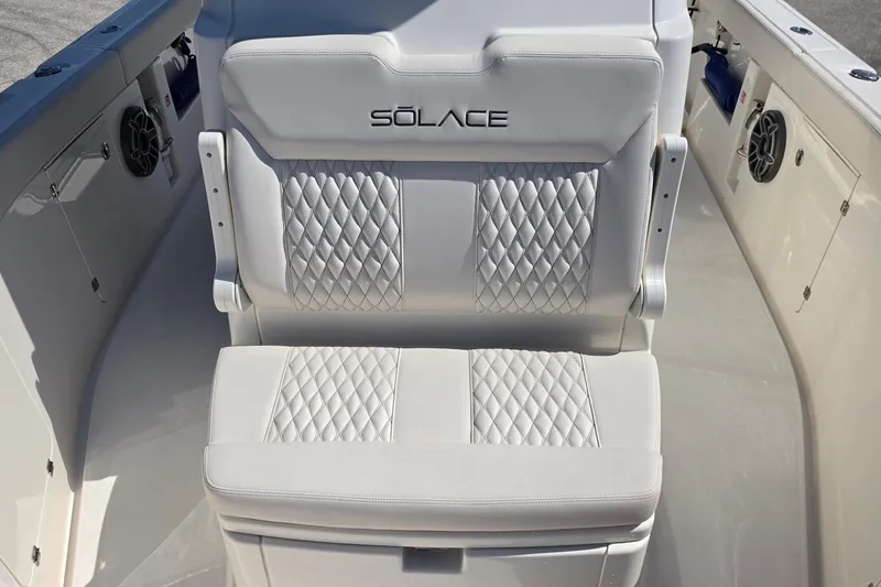 Slide: The Image of Luxurious seating on 2026 Solace 30CS boat with diamond-stitched upholstery. - 18
