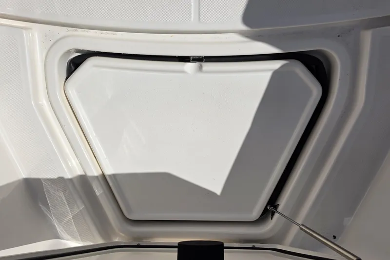 Slide: The Image of Hatch cover on 2026 Solace 30CS boat, featuring a sleek, modern design. - 21