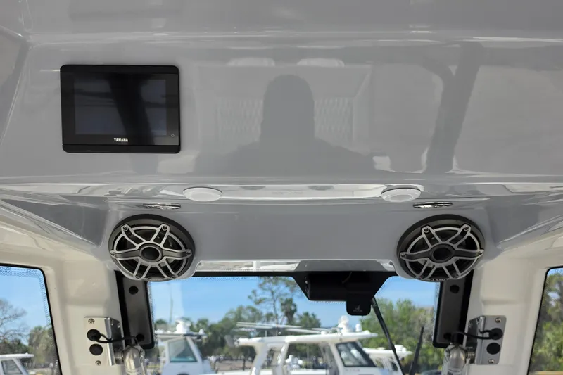 Slide: The Image of Interior of 2026 Solace 30CS boat featuring Yamaha display and speakers. - 28
