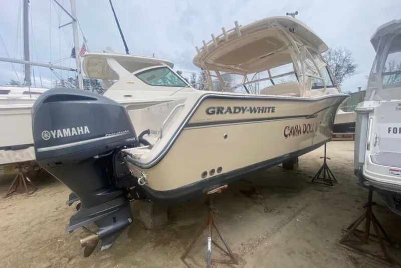 The Image of 2016 Grady-White Freedom 307 boat with Yamaha engine on dry dock. - 1