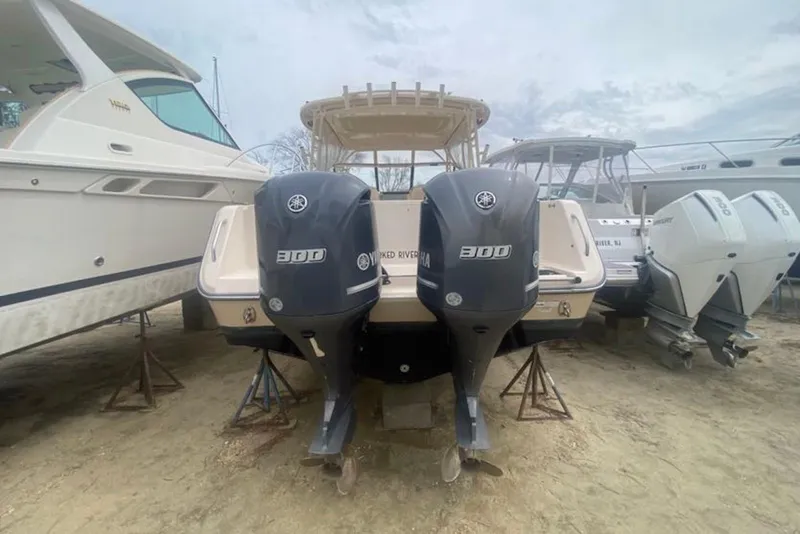 Slide: The Image of 2016 Grady-White Freedom 307 boat with twin Yamaha 300 engines on display. - 3