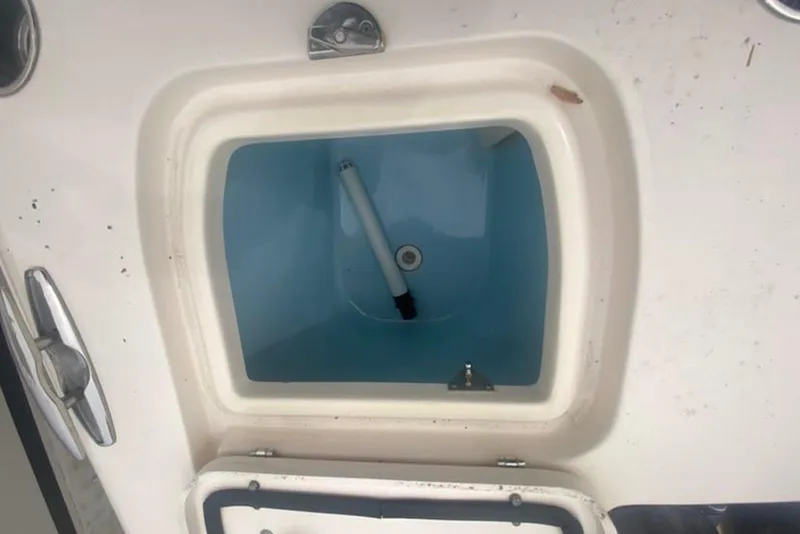 Slide: The Image of Livewell compartment on a 2016 Grady-White Freedom 307 boat. - 9
