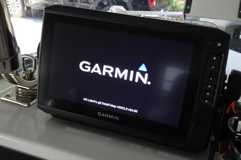 Slide: The Image of Garmin navigation system on 2023 Crestliner 2000 Bay boat dashboard. - 13