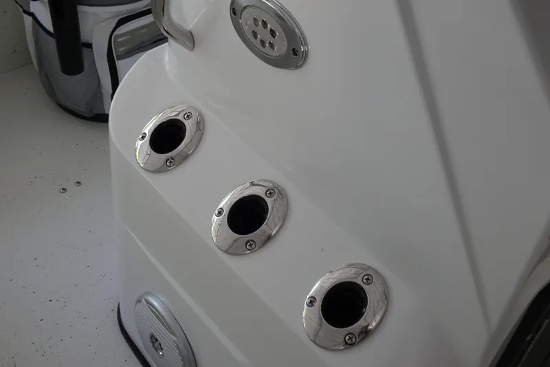 Slide: The Image of 2023 Crestliner 2000 Bay boat interior with stainless steel rod holders. - 16