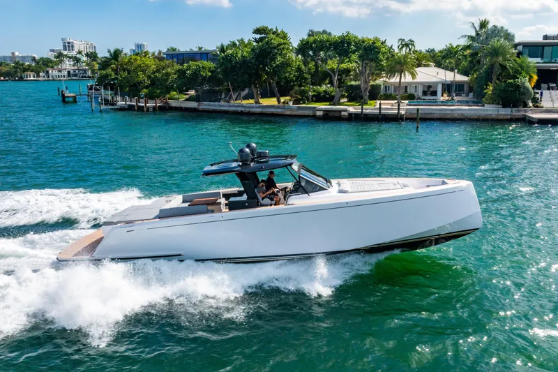 Slide: The Image of 2023 Pardo 50 yacht cruising on a sunny day near a tropical shoreline. - 15