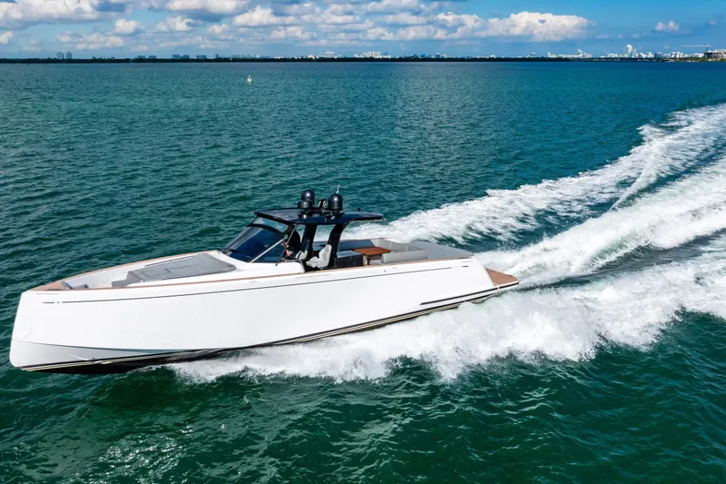Slide: The Image of 2023 Pardo 50 yacht cruising on open water under a clear sky. - 19
