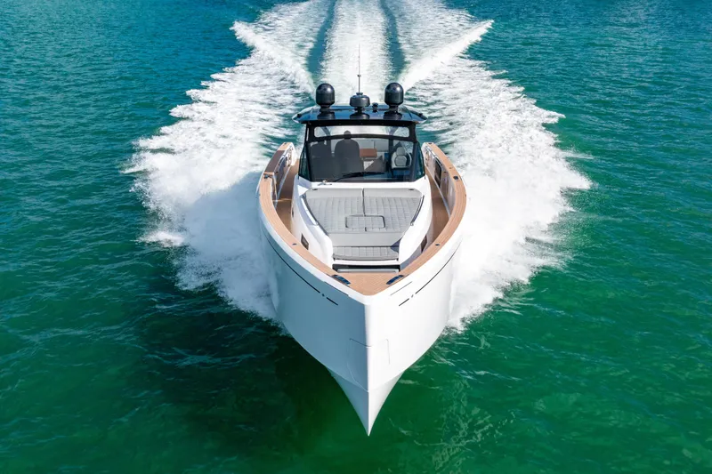 Slide: The Image of 2023 Pardo 50 yacht cruising on clear blue water, showcasing sleek design and performance. - 28
