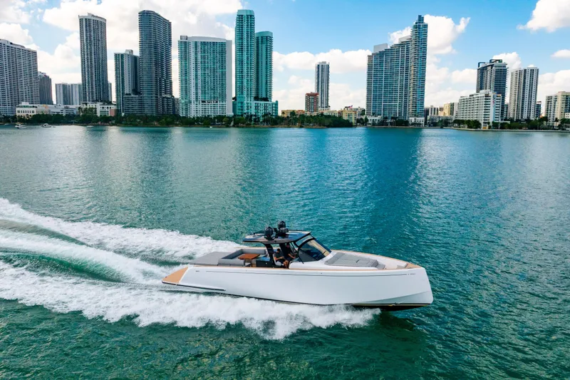 Slide: The Image of 2023 Pardo 50 yacht cruising in a city skyline backdrop. - 35
