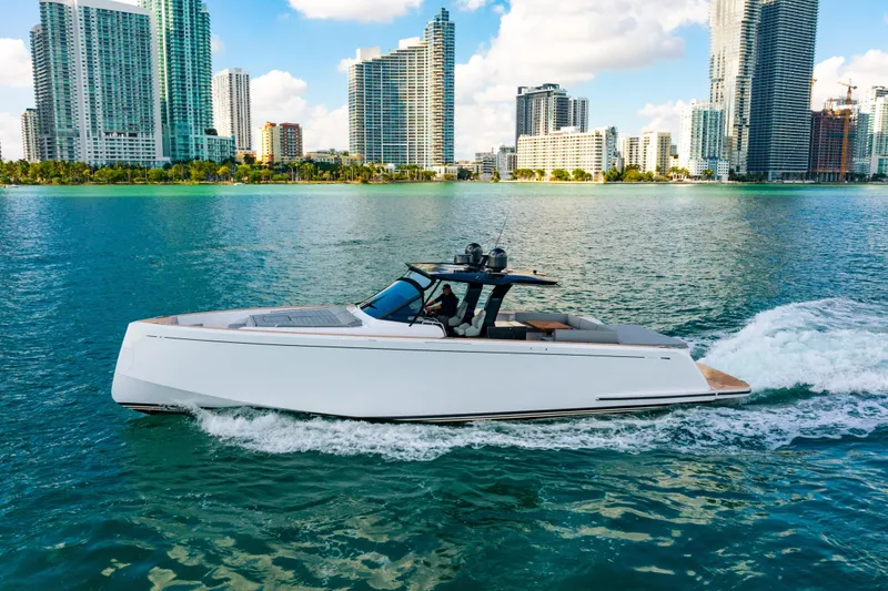 Slide: The Image of 2023 Pardo 50 yacht cruising in a cityscape waterfront setting. - 36