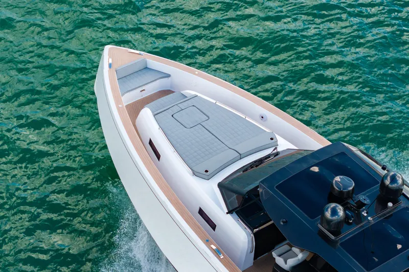 Slide: The Image of 2023 Pardo 50 luxury yacht cruising on clear blue water. - 47