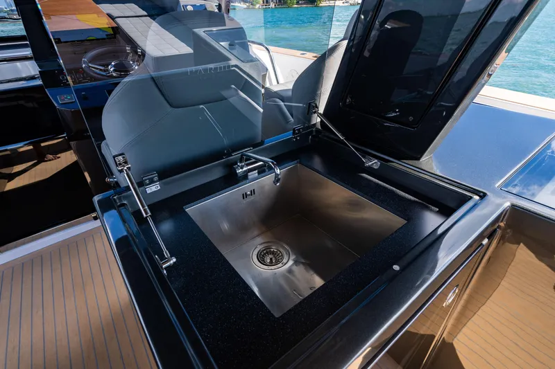 Slide: The Image of Luxury yacht Pardo 50 interior with sleek stainless steel sink, 2023 model. - 63