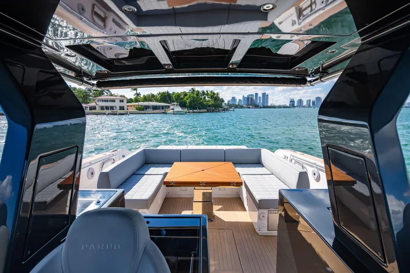 Slide: The Image of Luxurious 2023 Pardo 50 yacht interior with waterfront cityscape view. - 66