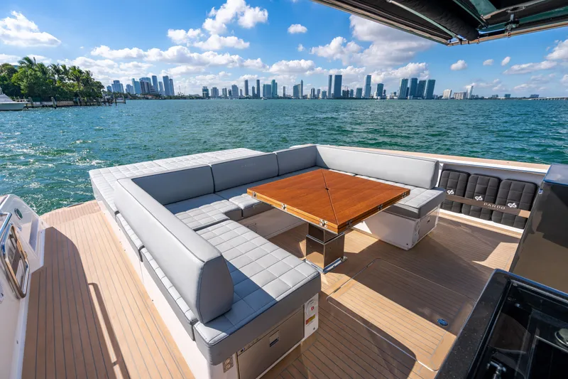 Slide: The Image of Luxury 2023 Pardo 50 yacht with elegant seating, city skyline view. - 74