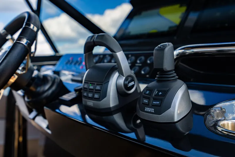 Slide: The Image of Control panel of 2023 Pardo 50 yacht featuring Volvo Penta joystick and throttle. - 83