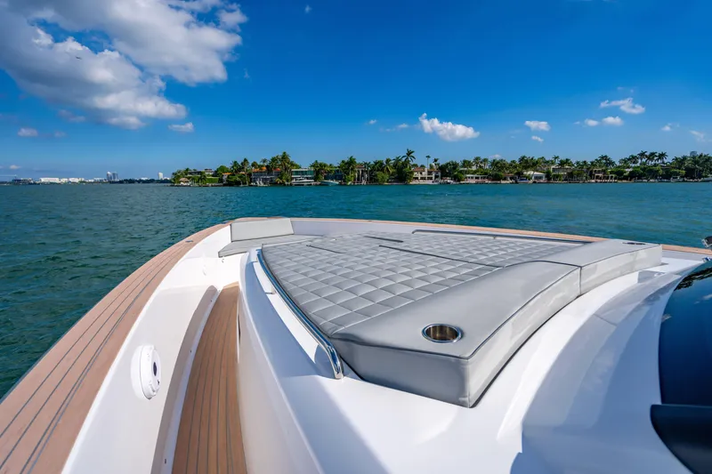Slide: The Image of Luxury Pardo 50 yacht deck with sunbed, cruising on a sunny day, 2023 model. - 87