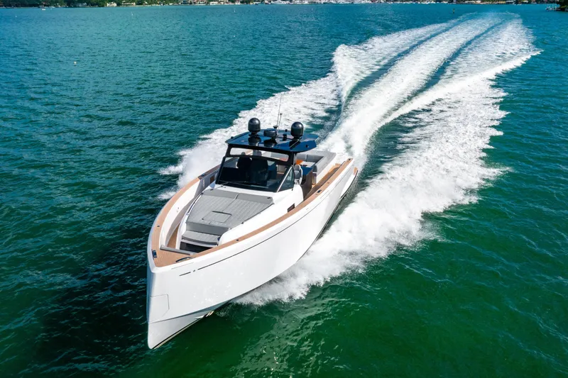 Slide: The Image of 2023 Pardo 50 yacht cruising on clear blue water, showcasing sleek design and speed. - 9