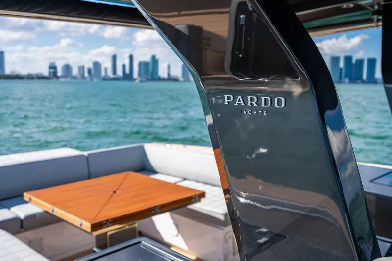 Slide: The Image of 2023 Pardo 50 yacht interior with city skyline in background. - 94