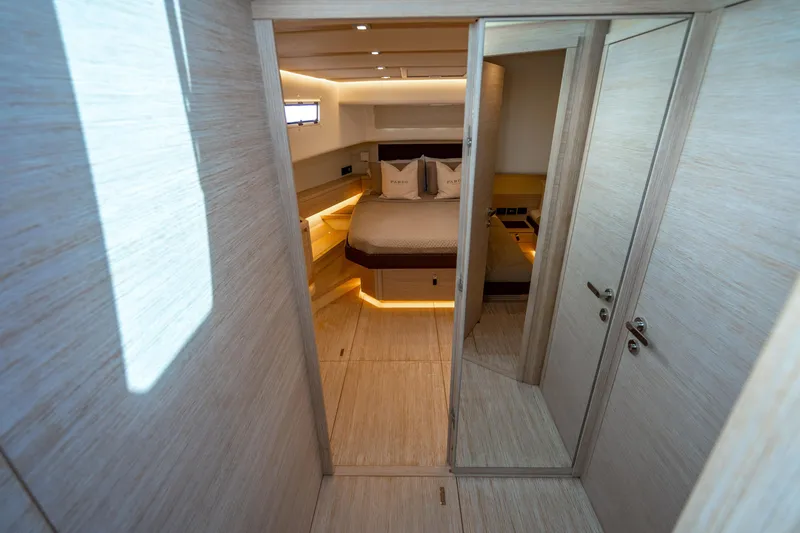 Slide: The Image of Luxurious interior of 2023 Pardo 50 yacht with modern bedroom design and ambient lighting. - 96