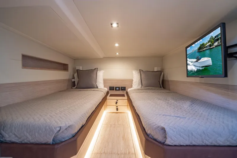 Slide: The Image of Luxurious cabin interior of 2023 Pardo 50 yacht with twin beds and TV. - 98