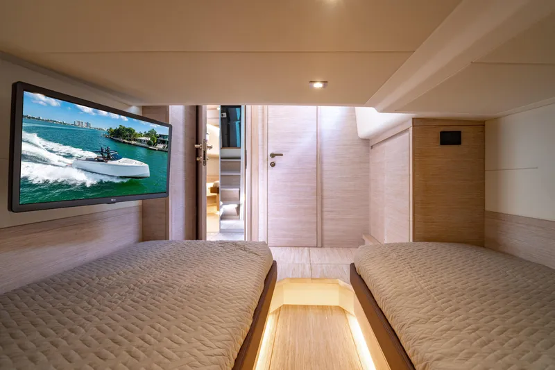 Slide: The Image of Luxurious interior of 2023 Pardo 50 yacht with twin beds and TV. - 99