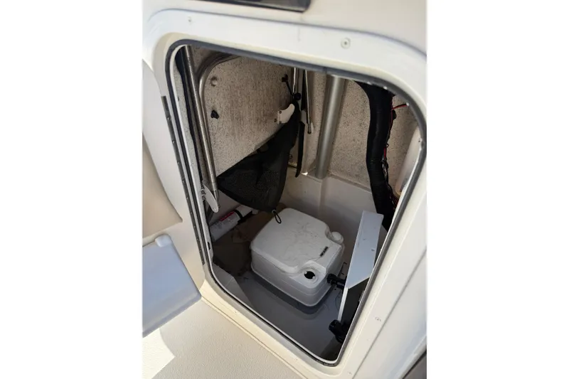 Slide: The Image of Interior storage compartment of 2023 Carolina Skiff 21 Ultra Elite boat. - 7