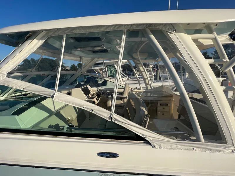 Slide: The Image of 2021 Boston Whaler 320 Vantage boat with enclosed cabin. - 5