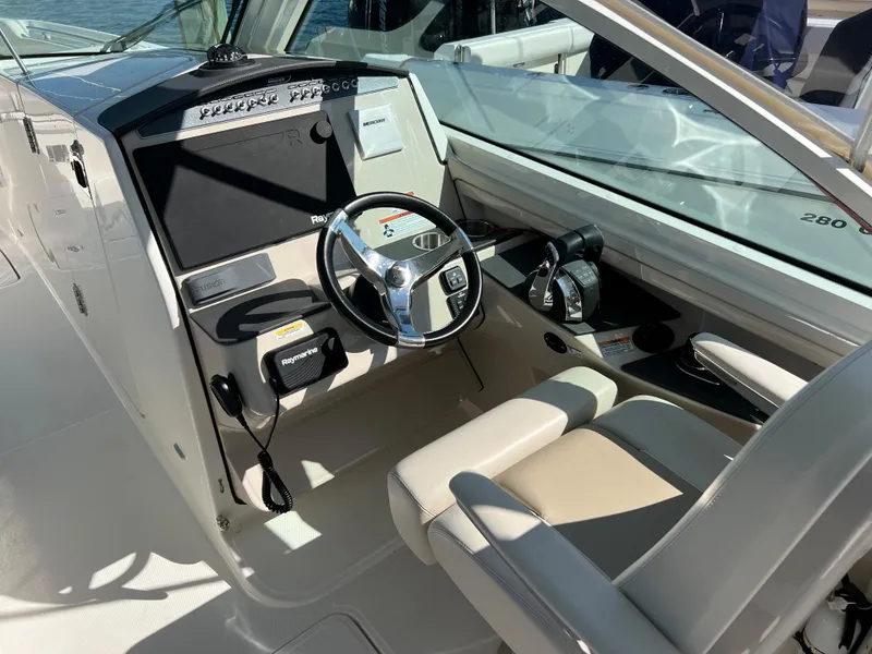 Slide: The Image of Interior view of 2021 Boston Whaler 320 Vantage cockpit. - 6