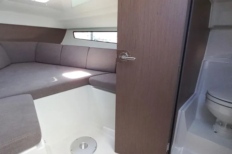 Slide: The Image of Interior of 2026 Beneteau Flyer 8 SUNdeck with seating and toilet. - 11