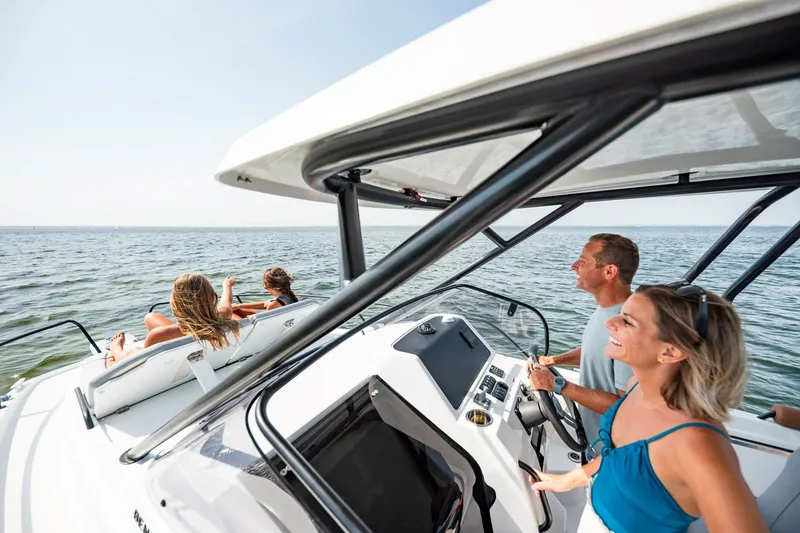 Slide: The Image of Beneteau Flyer 8 SUNdeck 2026 on water with happy passengers. - 6