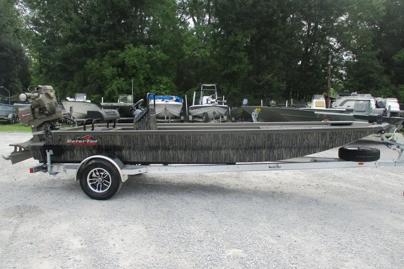 The Image of 2026 Gator Tail 2060 Extreme CC boat on trailer, parked outdoors. - 0
