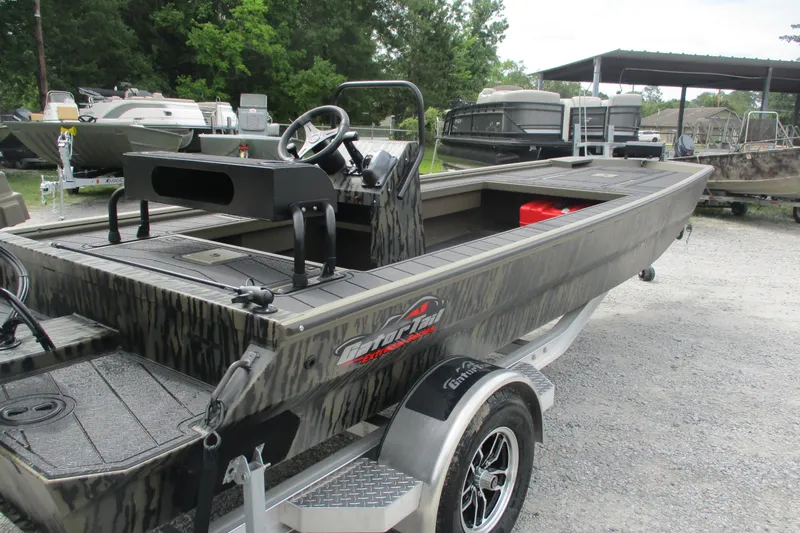 Slide: The Image of 2026 Gator Tail 2060 Extreme CC boat on trailer, parked outdoors. - 11