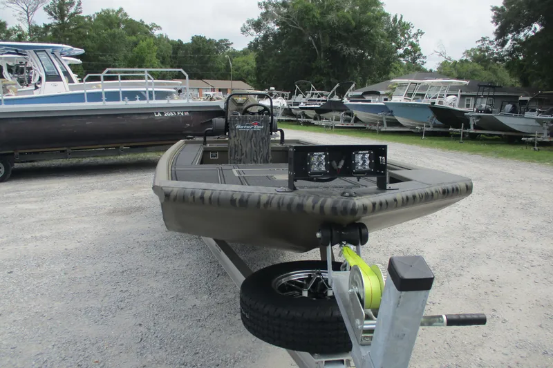 Slide: The Image of 2026 Gator Tail 2060 Extreme CC boat on trailer in outdoor lot. - 5