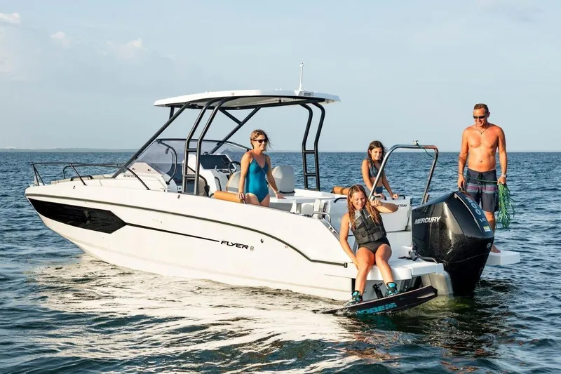 Slide: The Image of 2026 Beneteau Flyer 8 SUNdeck with people enjoying water activities. - 4