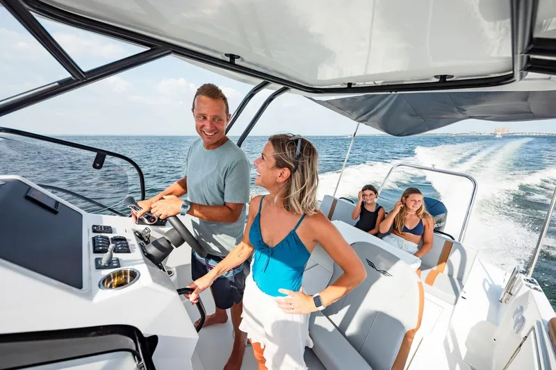 Slide: The Image of People enjoying a ride on the 2026 Beneteau Flyer 8 SUNdeck. - 7