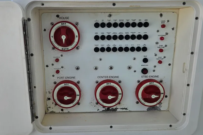 Slide: The Image of Control panel of a 2005 Hydra-Sports Vector 3300 VX boat with engine switches. - 20