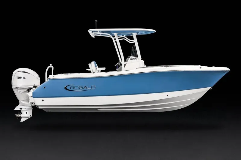 Slide: The Image of Manufacturer Provided Image: 2026 Robalo R230 Center Console boat with Yamaha engine, blue and white design. - 4