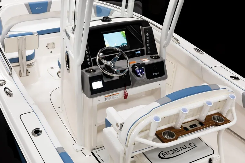 Slide: The Image of Manufacturer Provided Image: 2026 Robalo R230 Center Console boat interior with modern dashboard and seating. - 8